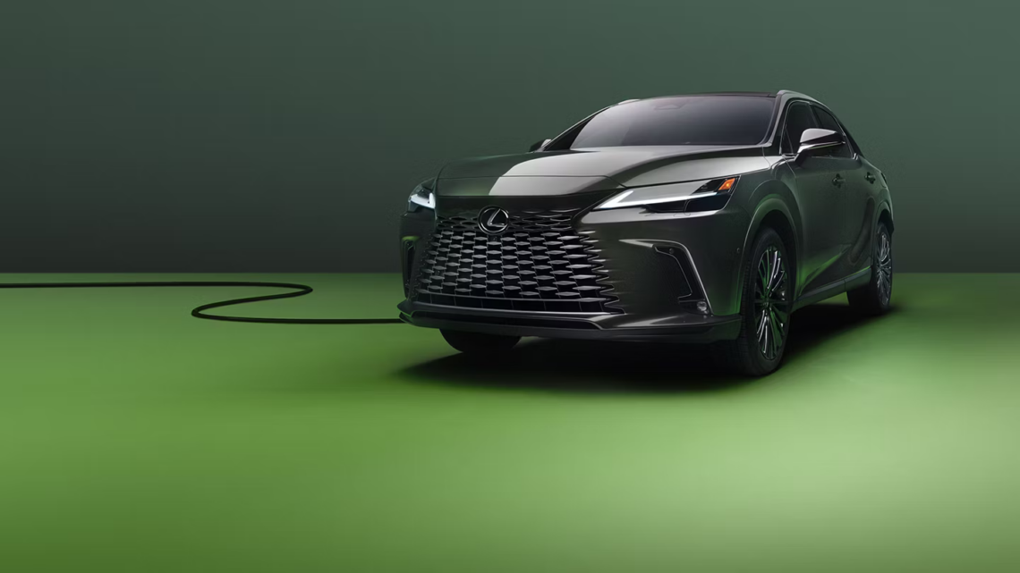 Green 2026 Lexus RX PHEV plugged in