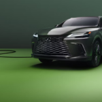 Green 2026 Lexus RX PHEV plugged in