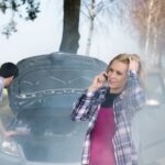 Couple dealing with an overheating engine